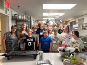 youth group gathered in church kitchen